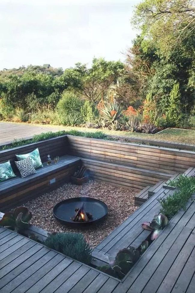 Sunken Wood Seating Around Fire