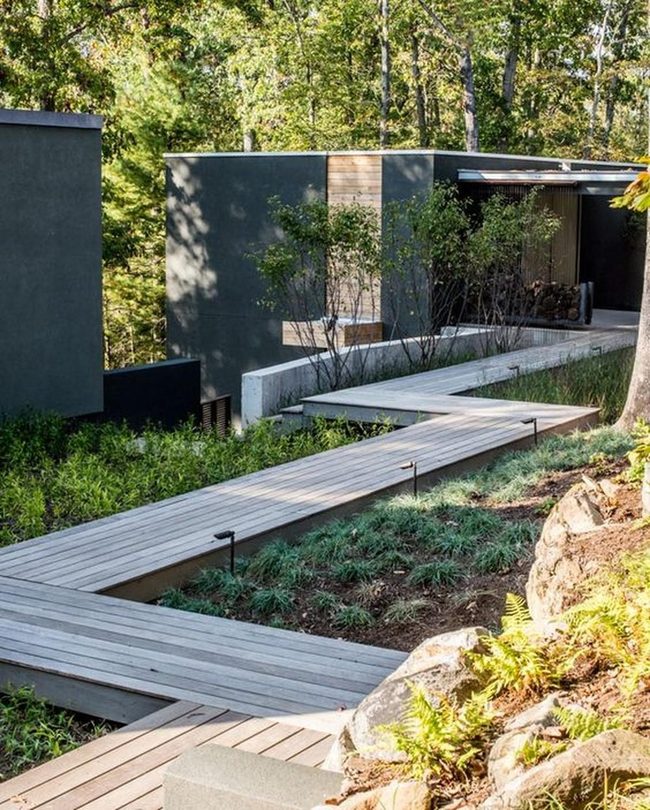 Modern Gray Home Nestled In Lush Garden