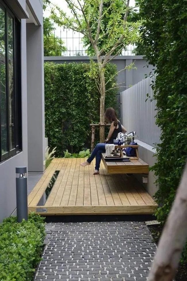 Gray Building Wooden Deck Retreat