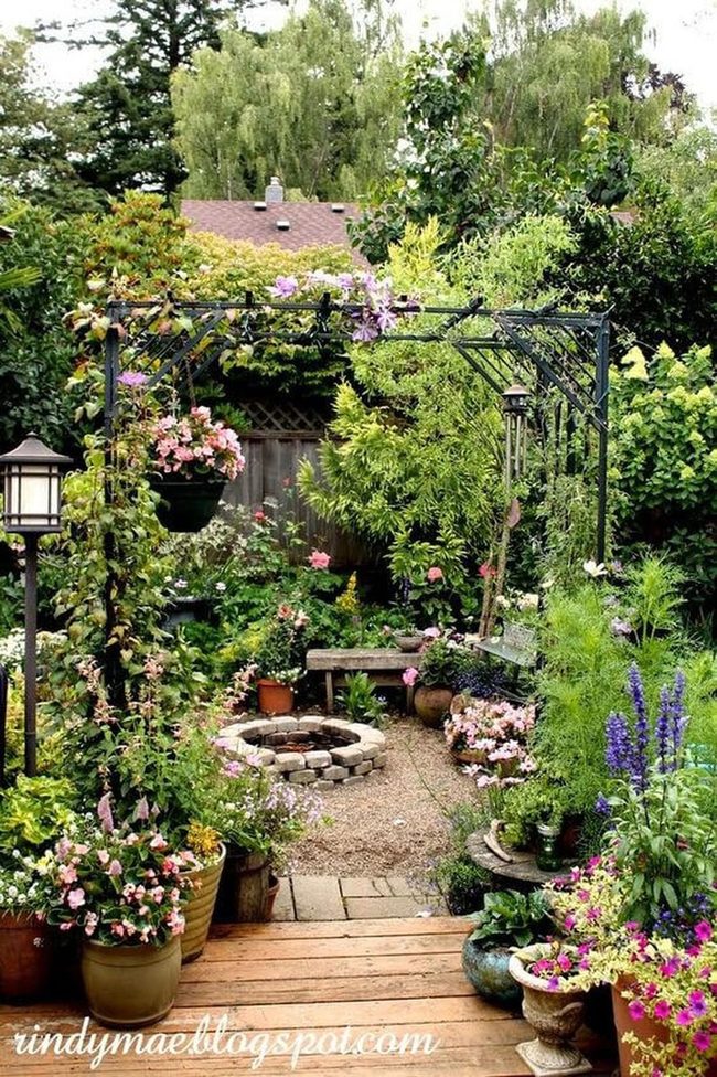Terracotta Pots Under Green Archway