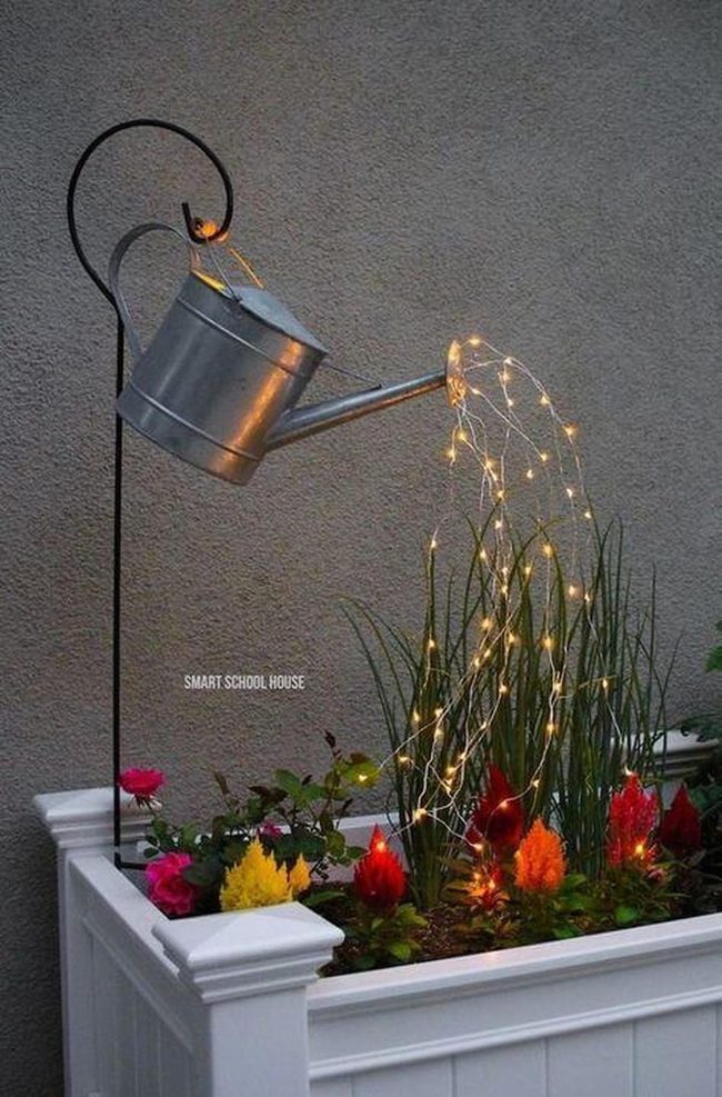 Glowing Watering Can Garden Sculpture