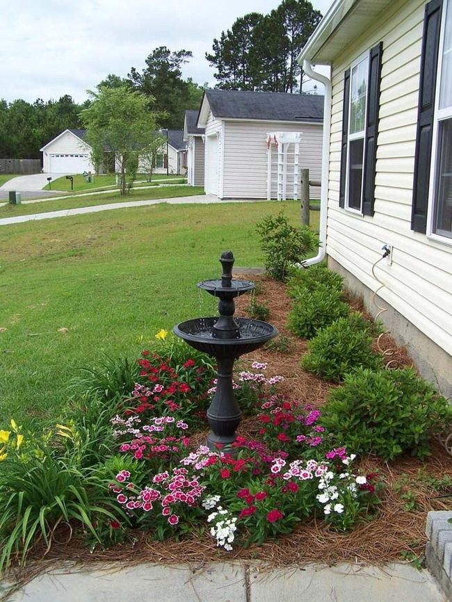 Two-Tier Fountain Draws Garden Birds