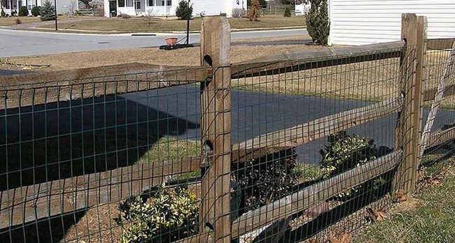 Split Rail Fencing With Protective Wire