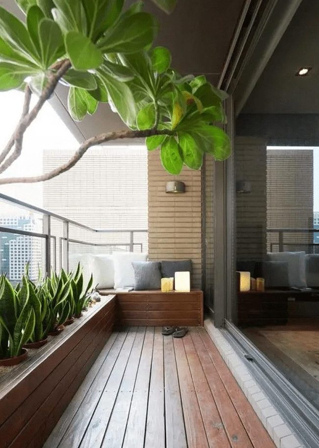 Wooden Balcony With Green Shelter