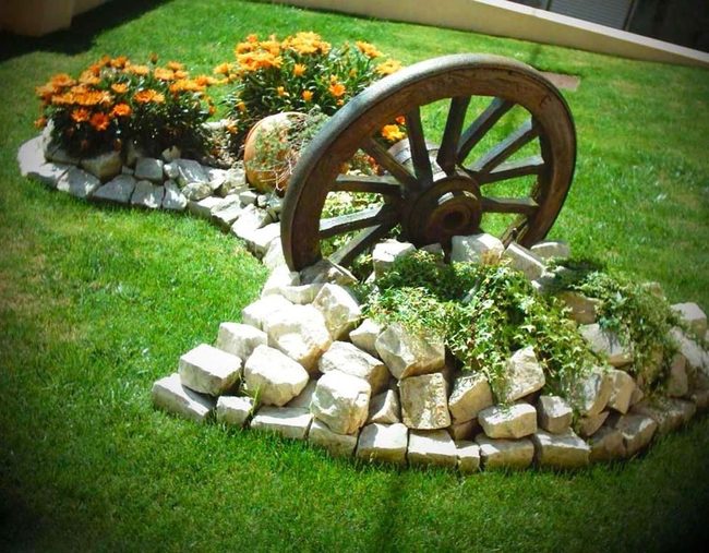 Weathered Wheel With Golden Marigolds