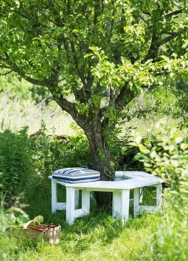 Tree Trunk Benches With Striped Cushions