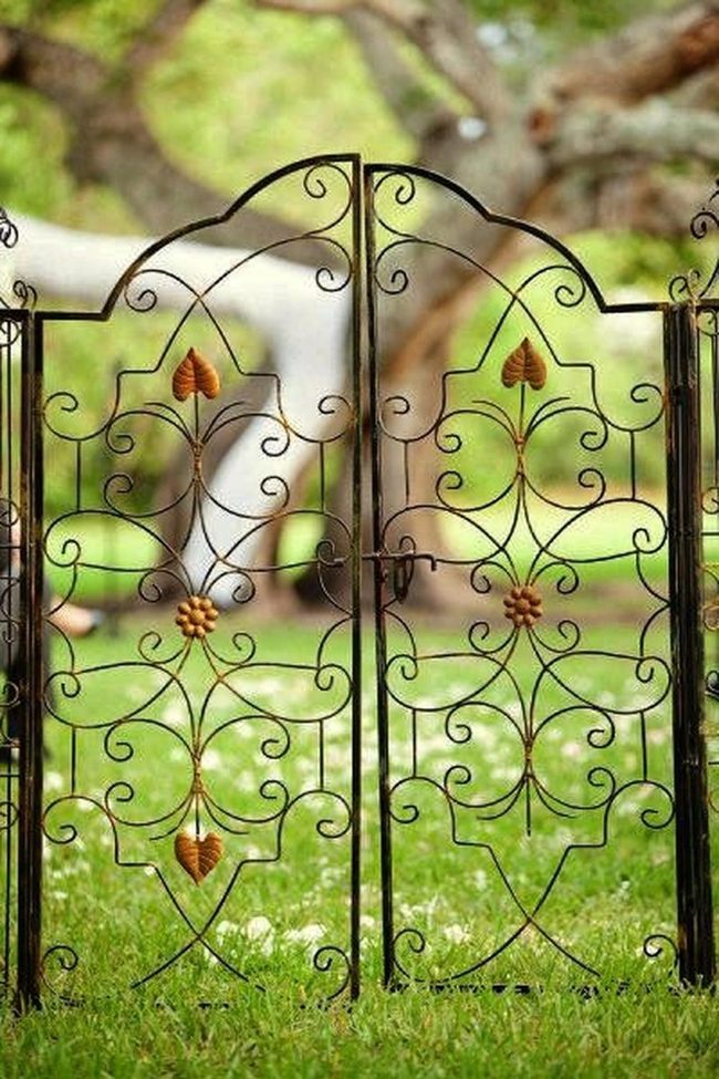 Gilded Iron Gateway Meets Garden