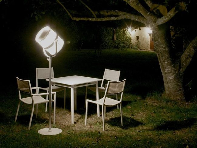White Furniture Under Canopy Shadows
