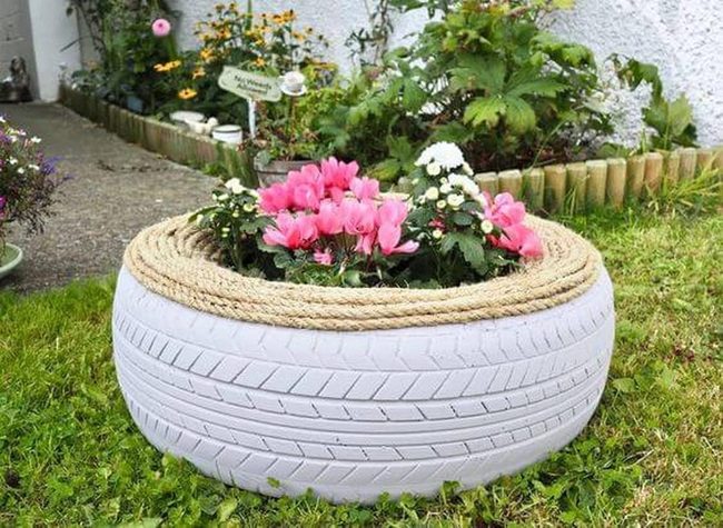 Rope-Wrapped Tire Planter Blooms