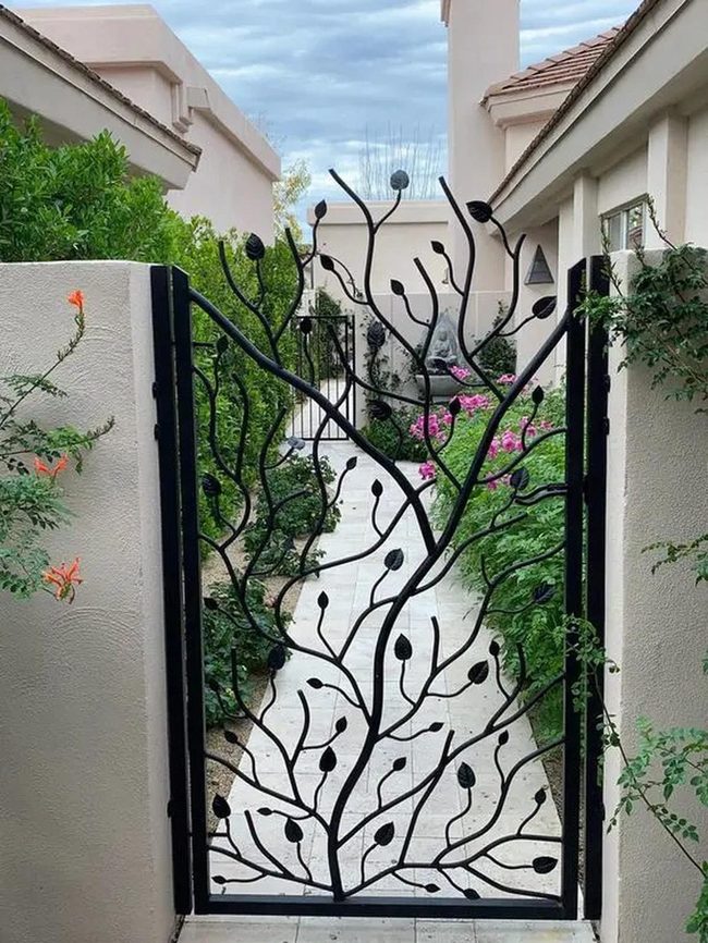 Stone Path Through Blooming Garden Walls