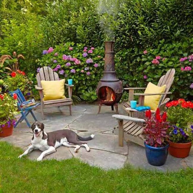 Crackling Fire Pit With Wooden Seating