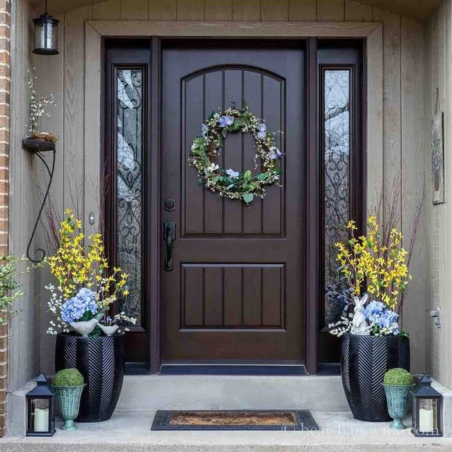 Black Ceramic Pots With Bright Flowering Bursts
