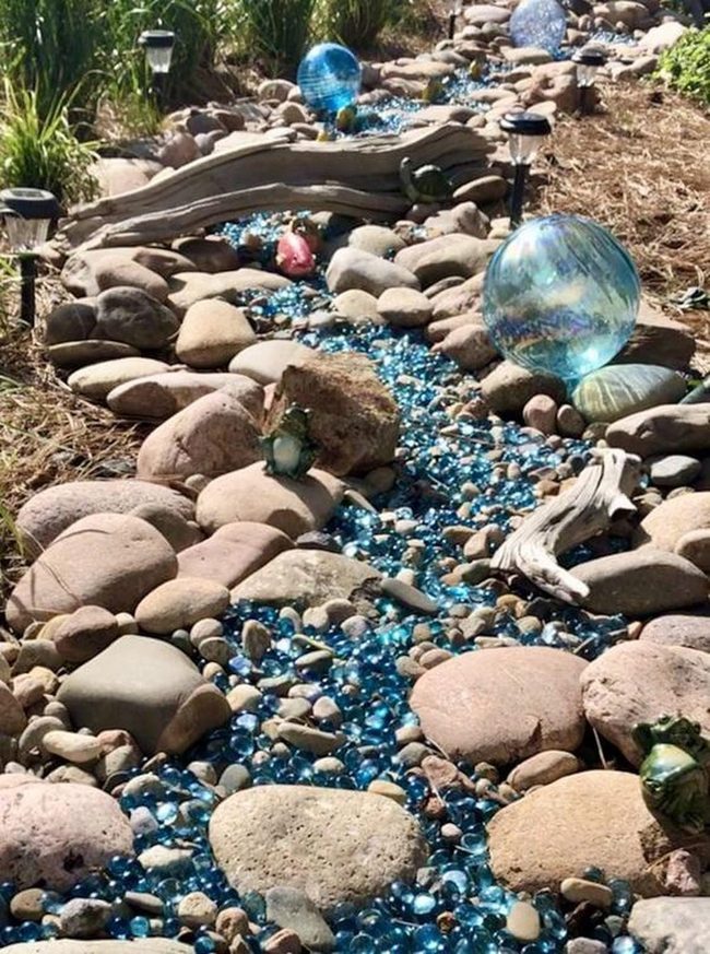 Blue Glass Gems Among Stones
