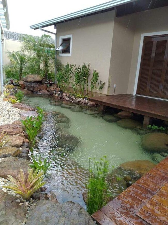 Shimmering Pond With Stone Edges