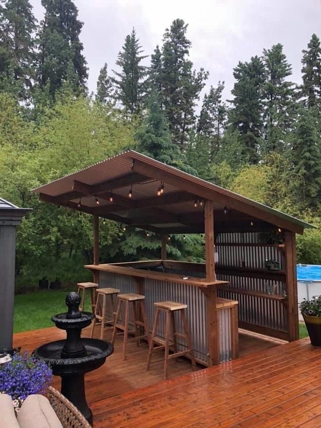 Green Sanctuary With Wooden Seating