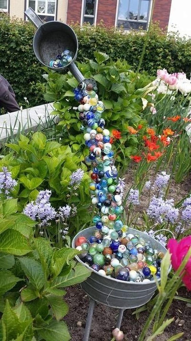 Marbles Pouring Garden Watering Can