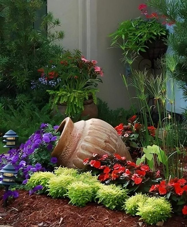 Purple Petunias Spilling From Overturned Pots