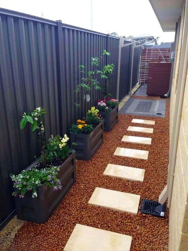 Charcoal Planters Transform Urban Corridor