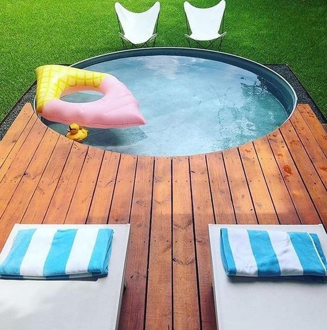 Poolside Pink Float And Wood Deck
