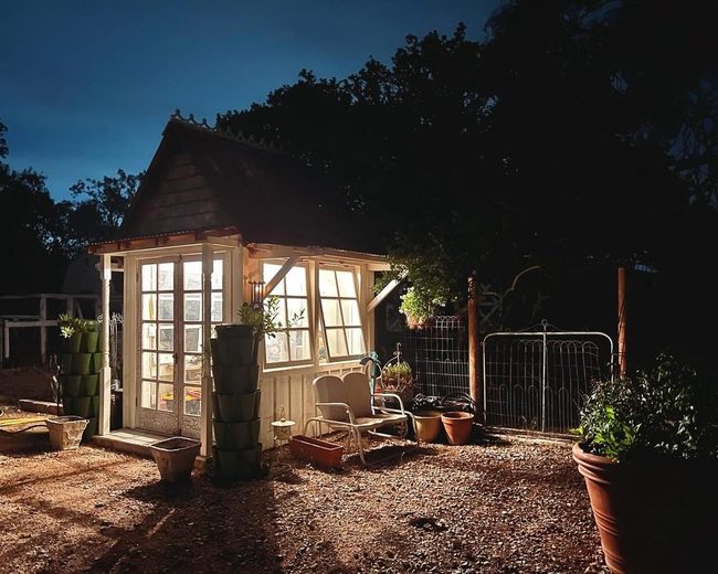 Twilight Garden Pavilion With Warm Lighting