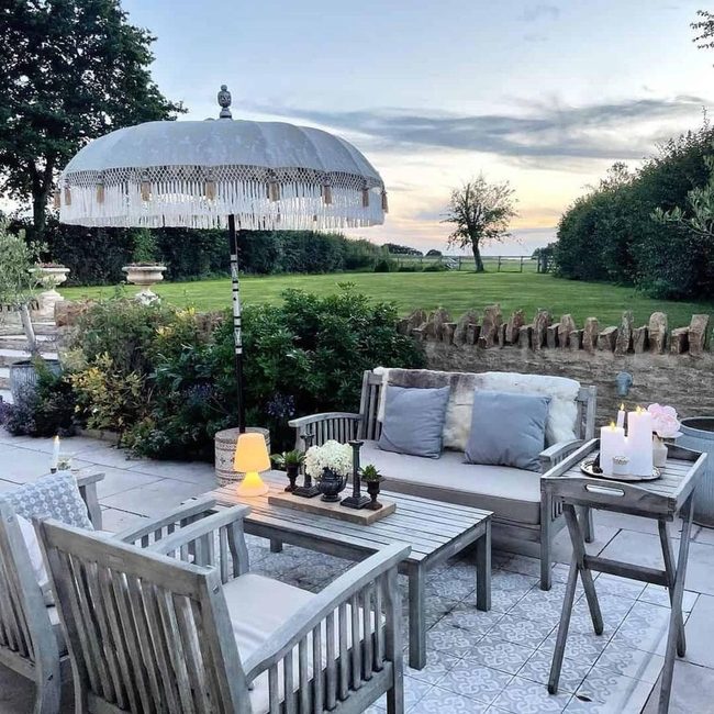 Wooden Garden Patio With Candlelit Flowers