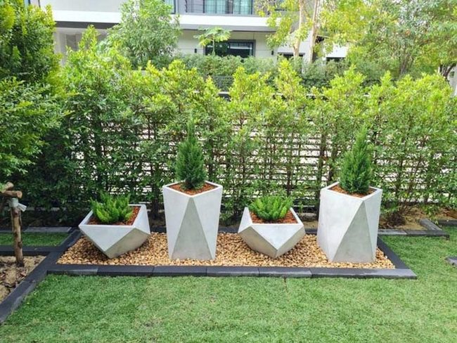 Layered Garden Heights With Black Pavers