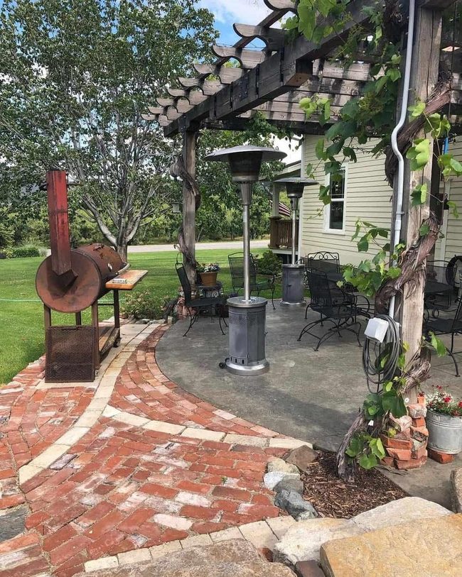 Dark Wood Pergola Grapevine Dining Haven