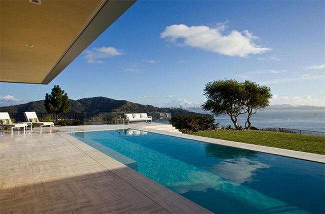 Blue Poolside Retreat With Ocean Views