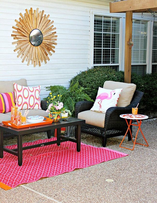 Flower-Filled Patio With Colorful Cushions