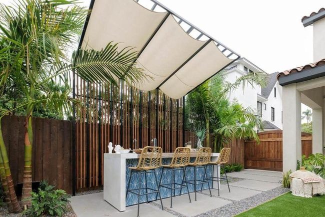 Concrete Bar With Blue Tile Accent
