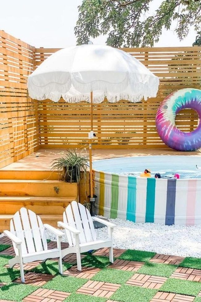 Striped Pool And Wooden Deck Escape