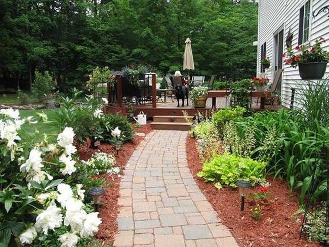 Flagstone Paths Through Pink Begonias