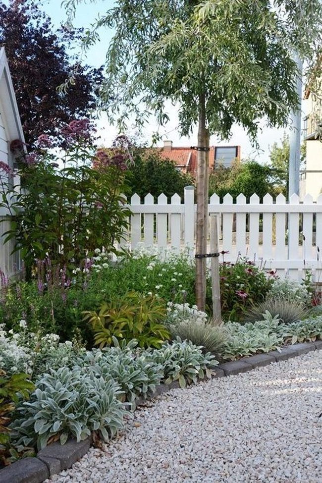 White Picket Garden With Shade Tree