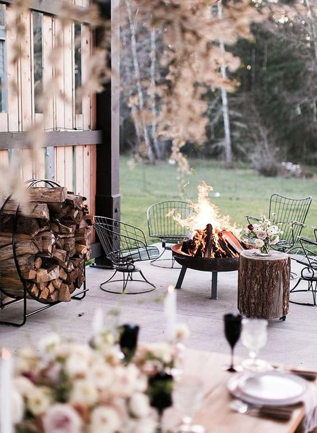 Black Chairs Around Glowing Flames