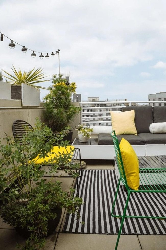 Yellow Pillows Brighten Urban Rooftop