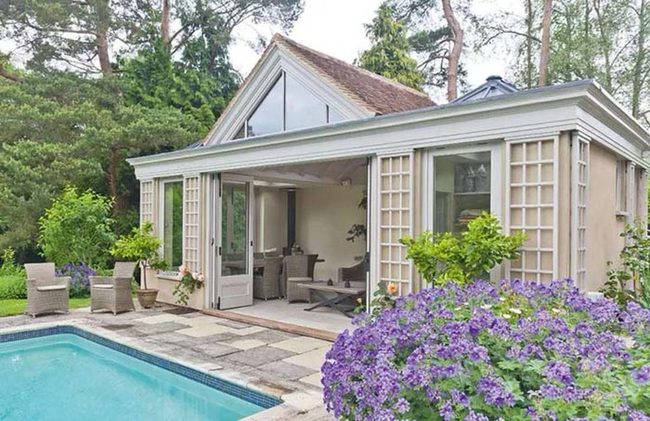 Sunlit Pool Room With Garden Views