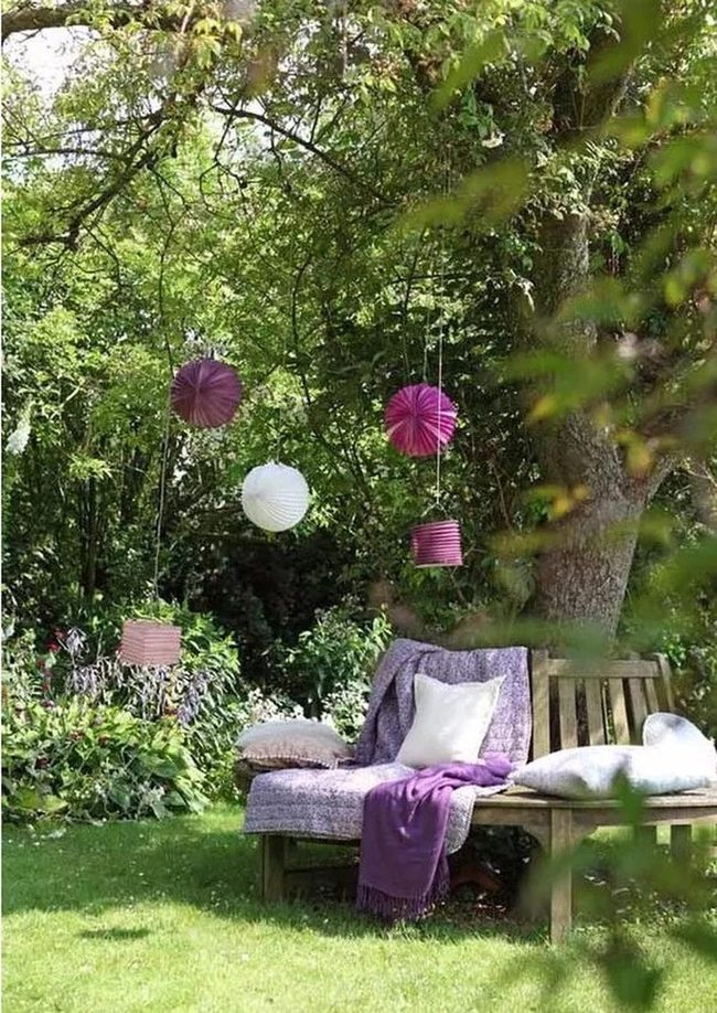 Purple Throws Among Green Garden Spaces