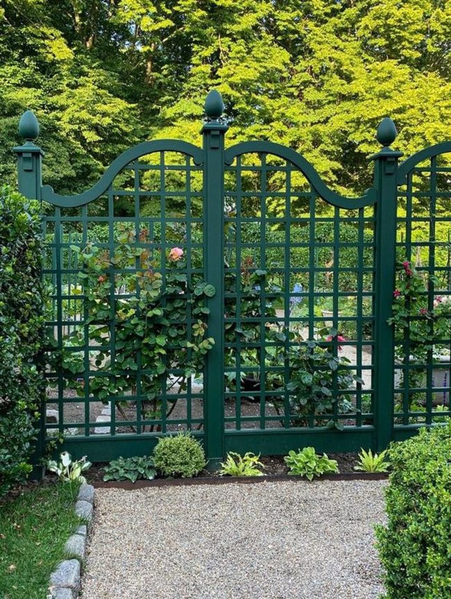 Green Trellis Gate Pink Climbing Flowers