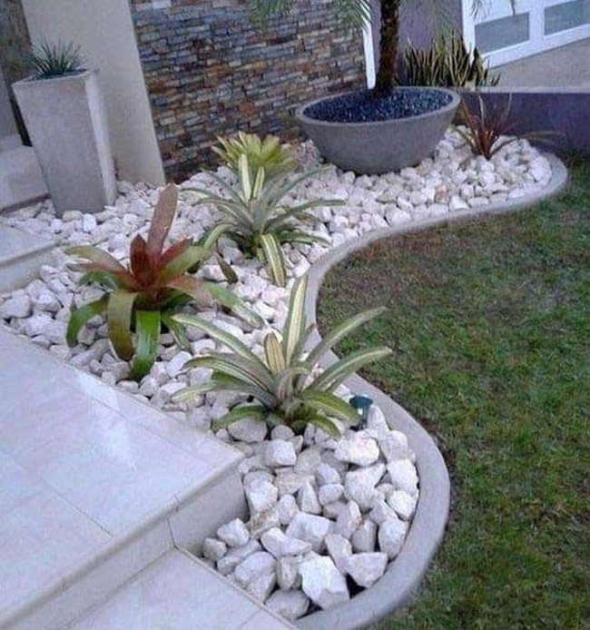 White Stones And Green Leafy Contemporary Garden