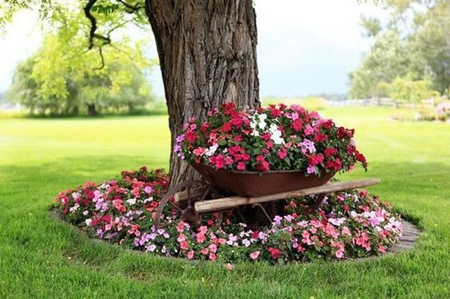 Overflowing Wheelbarrow Garden Statement