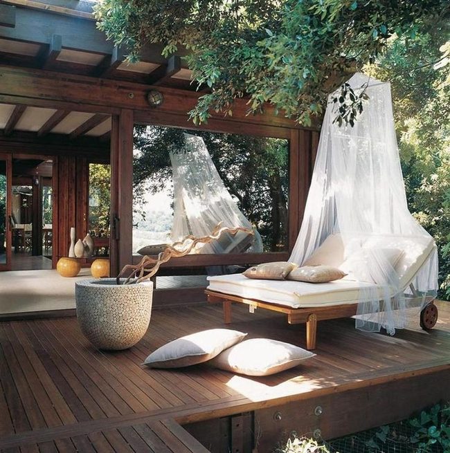 White Daybed Under Natural Canopy