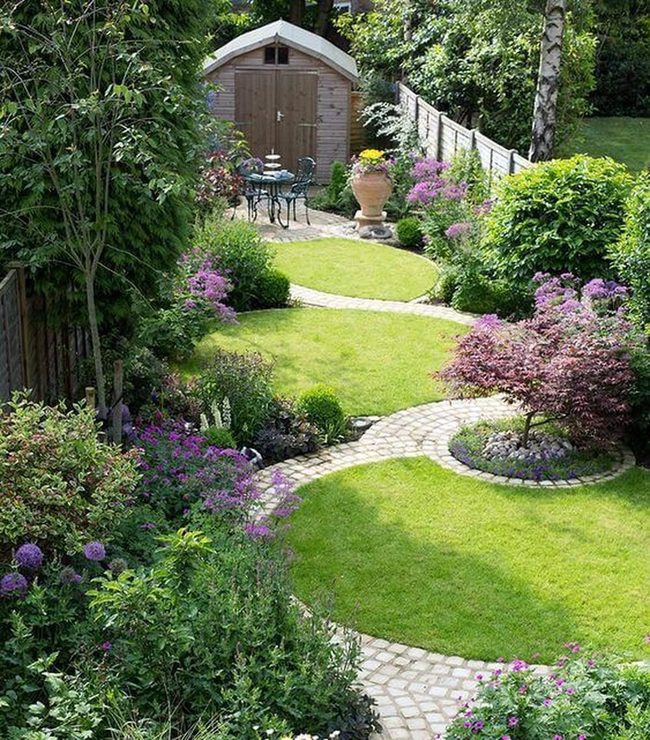 Curved Garden Path Through Blooming Borders