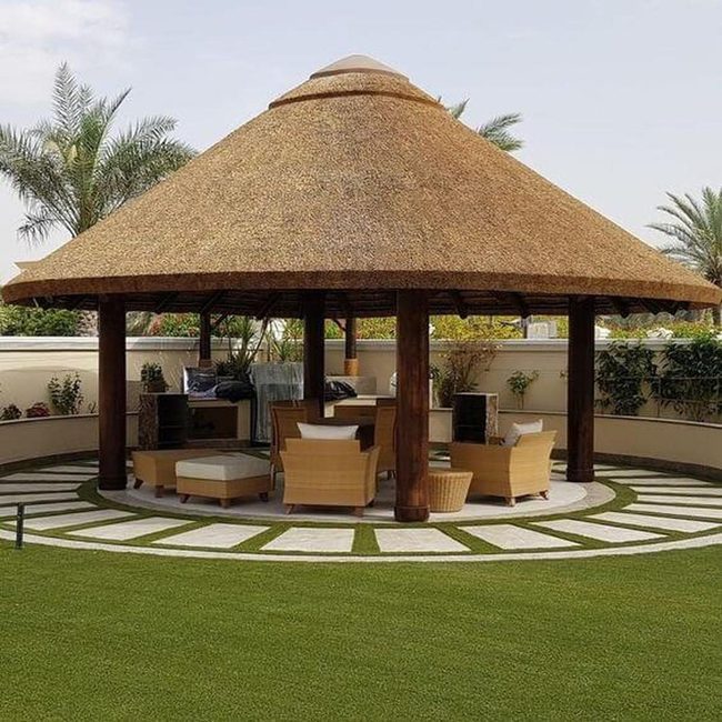 Thatched Pavilion Among Living Trees