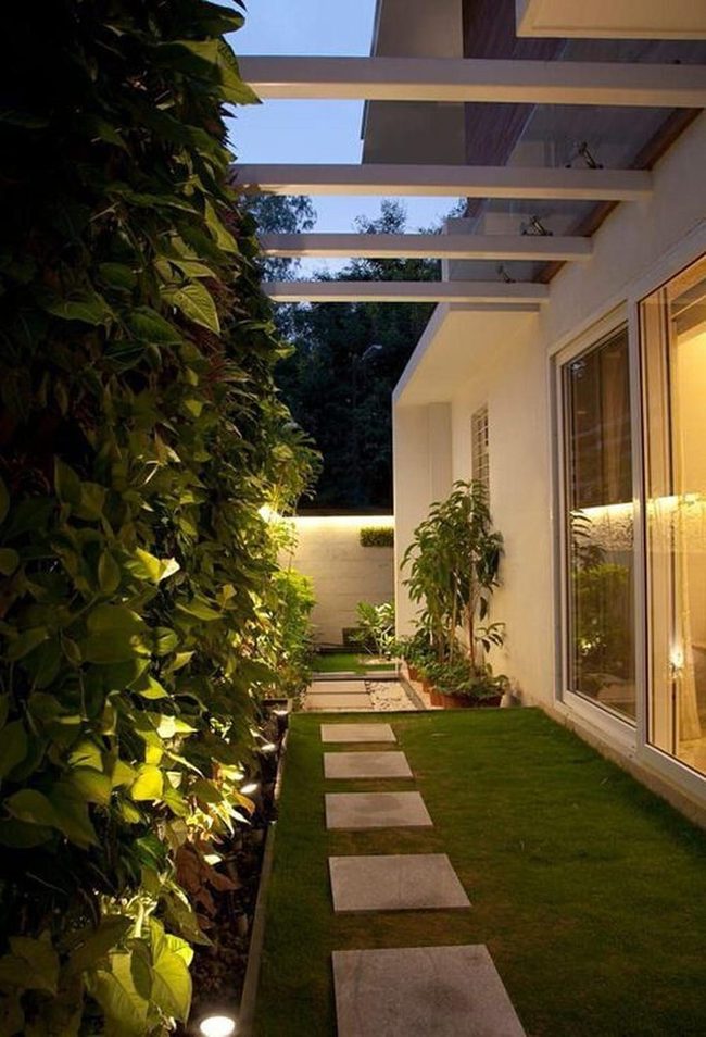 Geometric Stones Through Green Grass
