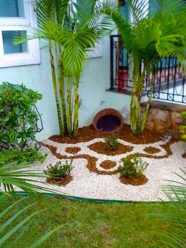 Pebbled Garden With Swaying Palms