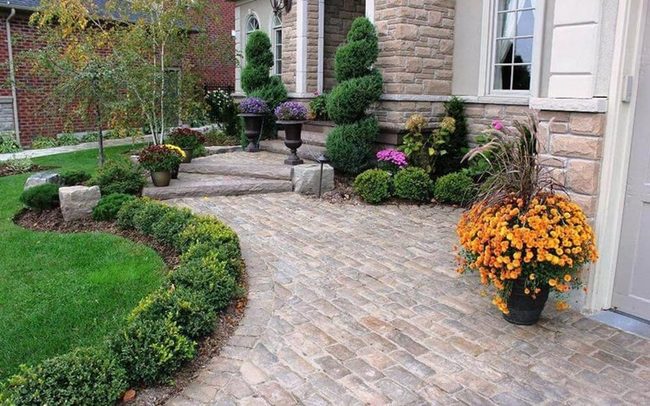 Colorful Planters And Shrubs Front Entry