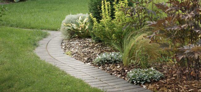 What Are the Key Benefits of Choosing Pavers for Your Walkway Design?