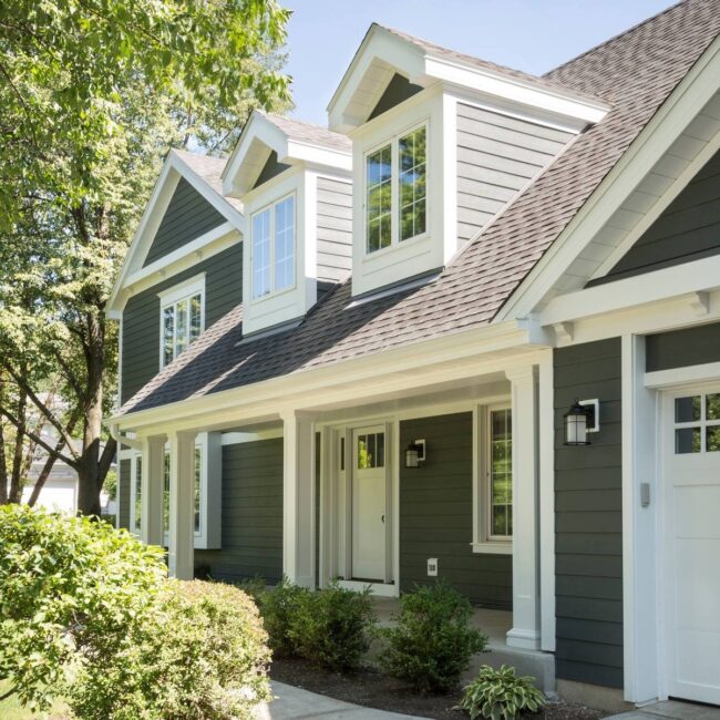 Traditional Green Siding with White Trim